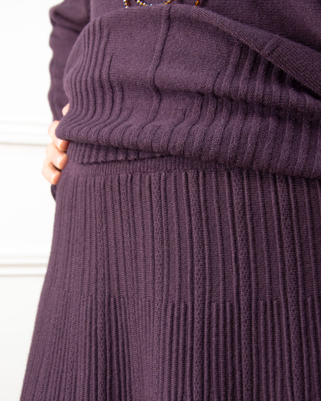 FALDA PUNTO OVER BERENJENA