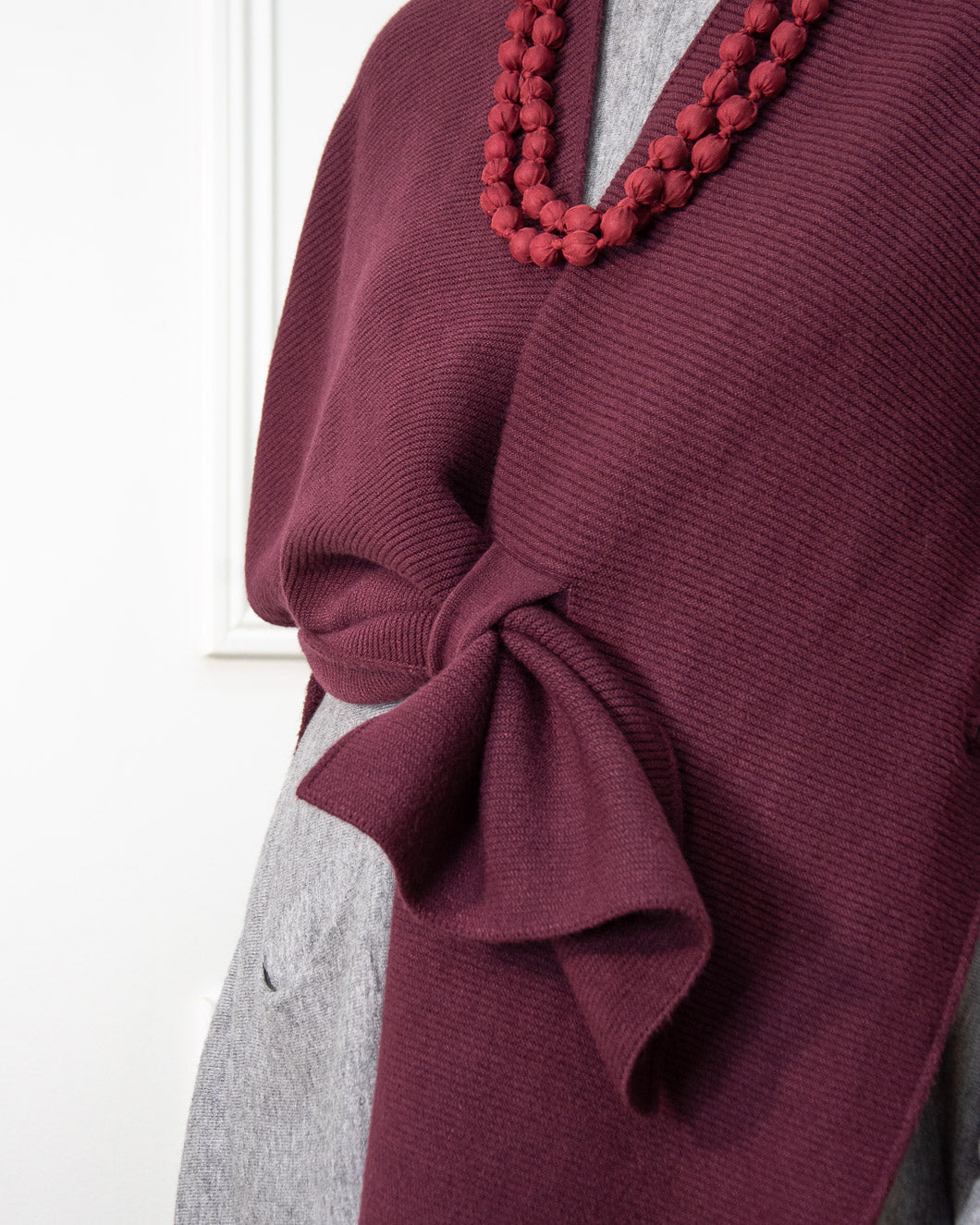 PONCHO BOTÓN GRANATE