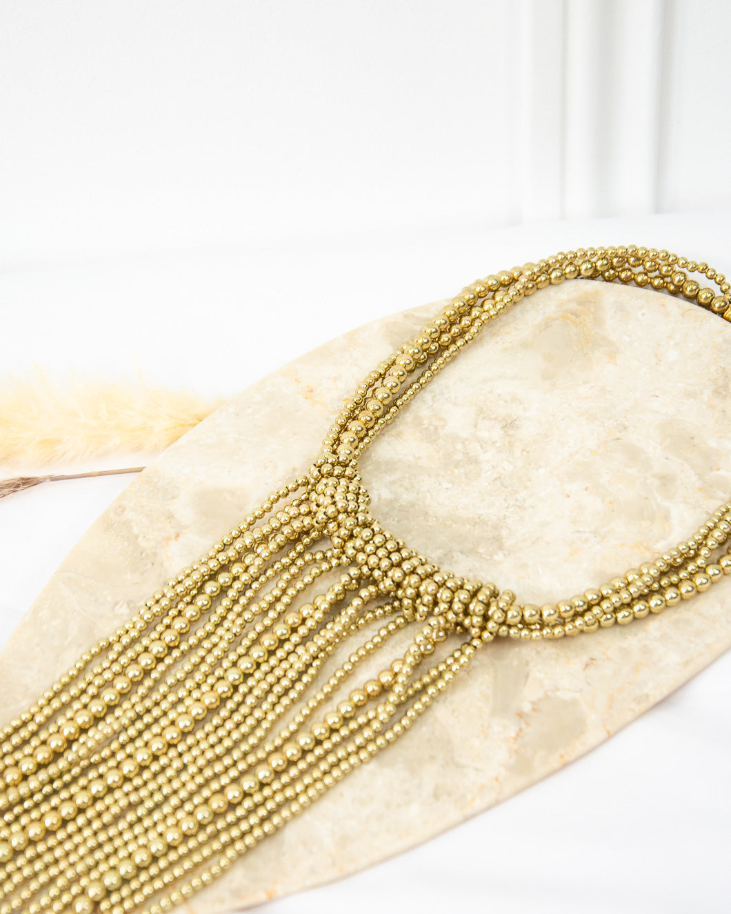 COLLAR FLECOS ORO