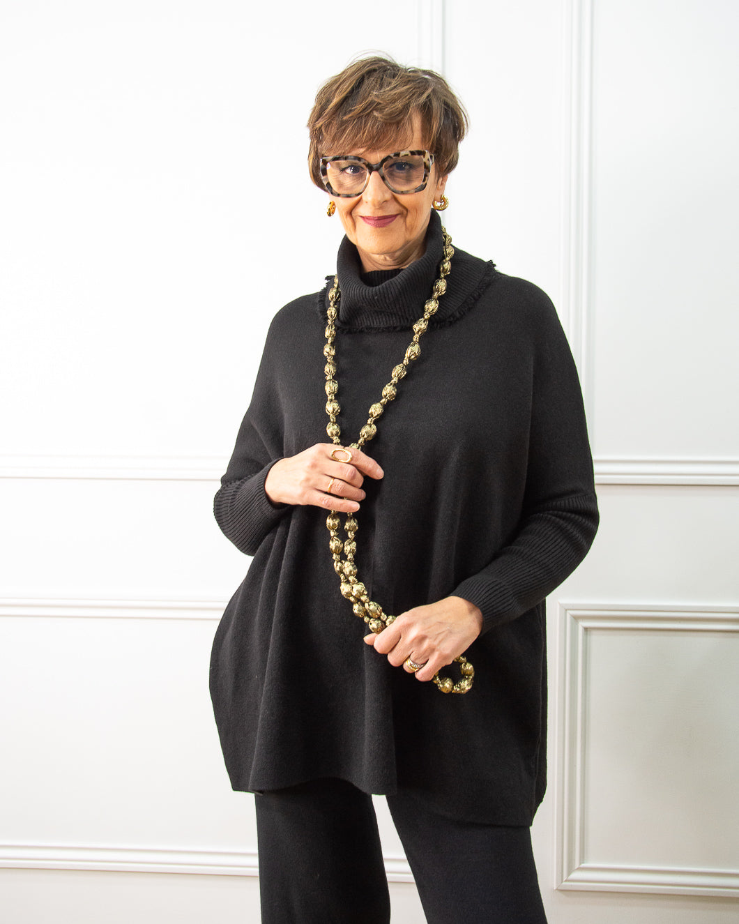 JERSEY CUELLO FLECOS NEGRO