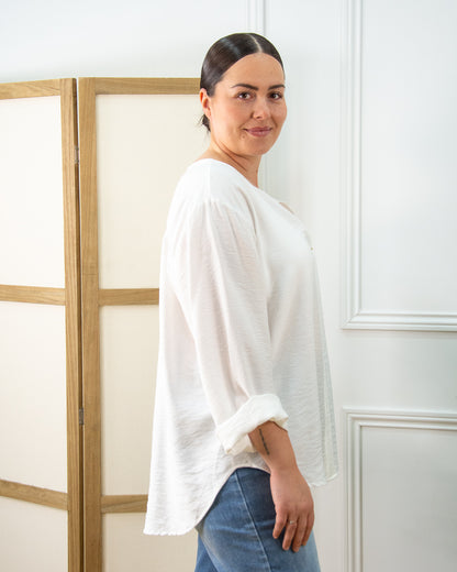 BLUSA BOTÓN BLANCO