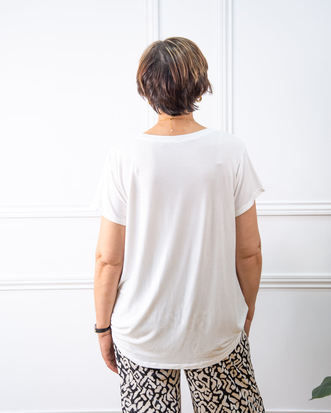 CAMISETA BOTONES BLANCO