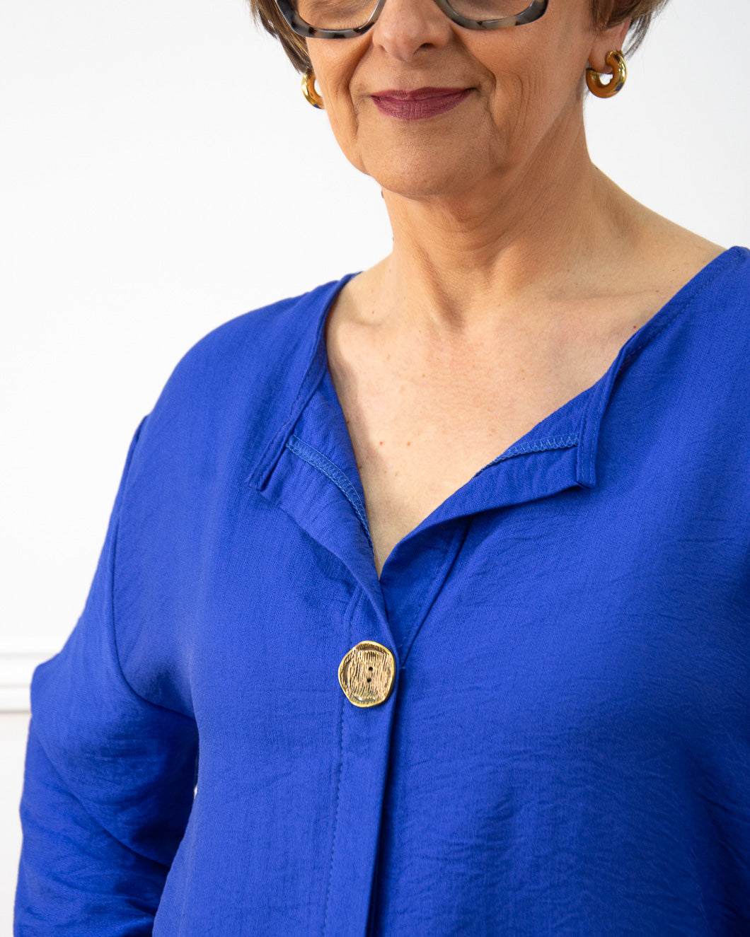 BLUSA BOTÓN AZUL